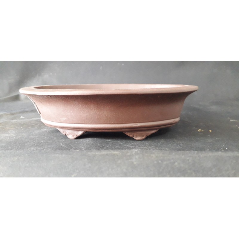 Maceta ovalada 24,5x17x6cm.